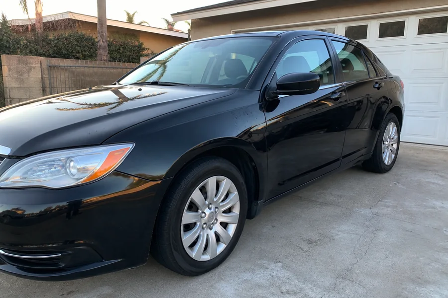 Freshly detailed black sedan service example